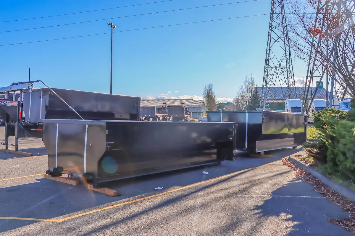 Roll-off dumpster ready for waste disposal at job site for 3 Yard Dumpster Rental in Doraville